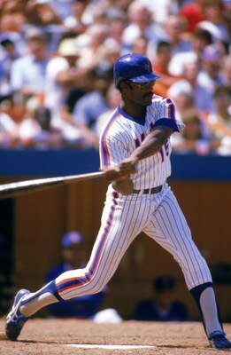 FLUSING, NY - 1985:  George Foster #15 of the New York Mets takes a swing during a game in 1985 at Shea Stadium in Flushing, New York.  (Photo by Rick Stewart/Getty Images)     