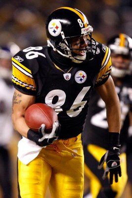 PITTSBURGH - JANUARY 18:  Hines Ward #86 of the Pittsburgh Steelers runs for yards after the catch on a 45-yard reception in the first quarter against the Baltimore Ravens during the AFC Championship game on January 18, 2009 at Heinz Field in Pittsburgh, 