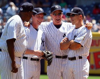 NEW YORK - JULY 19:  (L-R) Former New York Yankees Dwight Gooden, David Cone, and Mel Stottlemyre have a laugh with current manager Joe Girardi during the teams 63rd Old Timers Day before the game against the Detroit Tigers on July 19, 2009 at Yankee Stad