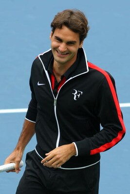 FLUSHING, NY - AUGUST 29:  Roger Federer of Switzerland smiles during Arthur Ashe Kid's Day at the 2009 U.S. Open at the Billie Jean King National Tennis Center on August 29, 2009 in the Flushing neighborhood of the Queens borough of New York City.  (Phot
