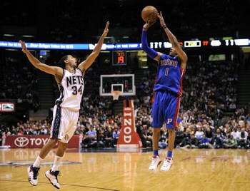 EAST RUTHERFORD, NJ - NOVEMBER 07:  Devin Harris #34 of the New Jersey Nets guards Allen Iverson #1 of the Detroit Pistons in their game November 7, 2008 at the Izod Arena in East Rutherford, New Jersey.  (Photo by Jeff Zelevansky/Getty Images)
