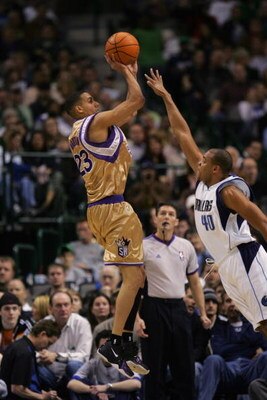 DALLAS - JANUARY 27:  Kevin Martin #23 of the Sacramento Kings shoots over Devean George #40 of the Dallas Mavericks during a game at the American Airlines Center on January 27, 2007 in Dallas, Texas.  The Mavs won 106-104.  (Photo by Ronald Martinez/Gett