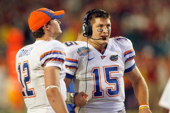 MIAMI - JANUARY 08:  Quarterback Tim Tebow #15 of the Florida Gators listens to the coaches with John Brantley #12 against the Oklahoma Sooners during the FedEx BCS National Championship Game at Dolphin Stadium on January 8, 2009 in Miami, Florida.  (Phot