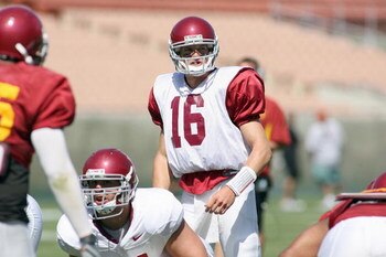 LOS ANGELES, CA - APRIL 25:  Quarterback Mitch Mustain #16 of the USC Trojans at the line of scrimmage during the spring game on April 25, 2009 at the Los Angeles Memorial Coliseum in Los Angeles, California.  The cardinal team won 16-10.  (Photo by Jeff 