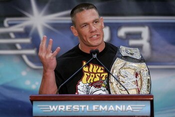 NEW YORK - MARCH 28:  Wrestler John Cena speaks at the press conference held by Battle of the Billionaires to announce details of Wrestlemania 23 at Trump Tower on March 28, 2007 in New York City.  (Photo by Bryan Bedder/Getty Images)