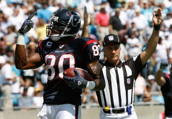CHARLOTTE, NC - SEPTEMBER 16:  Receiver Andre Johnson #80 of the Houston Texans signals to the crowd that he has two touchdowns in the first half of their 34-21 win over the Carolina Panthers at Bank of America Stadium on September 16, 2007 in Charlotte, 