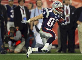GLENDALE, AZ - FEBRUARY 03:  Wes Welker #83 of the New England Patriots runs for a first down against the New York Giants during Super Bowl XLII on February 3, 2008 at the University of Phoenix Stadium in Glendale, Arizona. The Giants won 17-14.  (Photo b