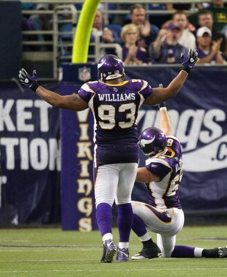 MINNEAPOLIS - SEPTEMBER 21:  Defensive linemen Kevin Williams and Jared Allen of the Minnesota Vikings celebrate a late 4th quarter sack against the Carolina Panthers at the HH Humphrey Metrodome on September 21, 2008 in Minneapolis, Minnesota.  (Photo by