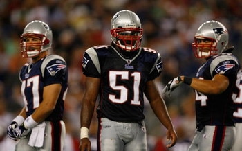 FOXBORO, MA - AUGUST 22: John Lynch #47, Jerod Mayo #51, and Tedy Bruschi #54 of the New England Patriots take a breather against the Philadelphia Eagles during preseason action at Gillette Stadium on August 22, 2008 in Foxboro, Massachusetts. (Photo by J
