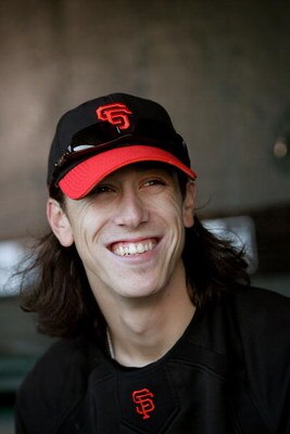 SAN FRANCISCO - AUGUST 26:  Tim Lincecum #55 of the San Francisco Giants sits in the dugout before their game against the Arizona Diamondbacks at AT&T Park on August 26, 2009 in San Francisco, California.  (Photo by Ezra Shaw/Getty Images for Reebok)