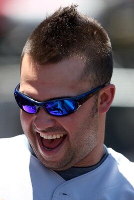 ANAHEIM, CA - JULY 11:    Nick Swisher #33 of the New York Yankees laughs in the dugout before the game against the Los Angeles Angels of Anaheim on July 11, 2009 at Angel Stadium in Anaheim, California.   (Photo by Stephen Dunn/Getty Images)