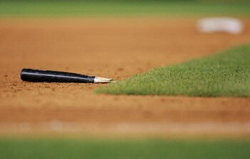 NEW YORK - AUGUST 10: The broken bat of Jose Bautista #23 of the Toronto Blue Jays lays in the infield during the game on August 10, 2009 at Yankee Stadium in the Bronx borough of New York City. (Photo by Jared Wickerham/Getty Images)