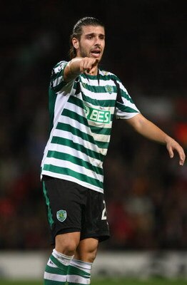MANCHESTER, UNITED KINGDOM - NOVEMBER 27:  Miguel Veloso of Sporting Lisbon gestures during the UEFA Champions League Group F match between Manchester United and Sporting Lisbon at Old Trafford on November 27, 2007 in Manchester, England. (Photo by Alex L