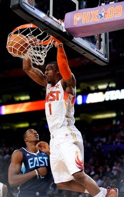 PHOENIX - FEBRUARY 15:  Amar'e Stoudemire #1 of the Western Conference dunks over Dwight Howard #12 of the Eastern Conference during the 58th NBA All-Star Game, part of 2009 NBA All-Star Weekend at US Airways Center on February 15, 2009 in Phoenix, Arizon