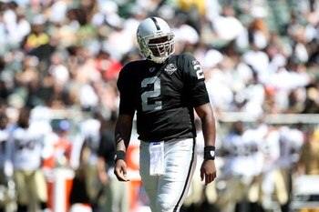 OAKLAND, CA - AUGUST 29:  Quarterback JaMarcus Russell #2 of the Oakland Raiders looks on against the New Orleans Saints during an NFL preseason game at Oakland-Alameda County Coliseum on August 29, 2009 in Oakland, California.  (Photo by Jed Jacobsohn/Ge