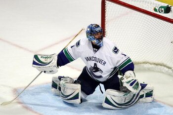 CHICAGO - MAY 07:  Goalie Roberto Luongo #1 of the Vancouver Canucks tends goal against the Chicago Blackhawks during Game Four of the Western Conference Semifinal Round of the 2009 Stanley Cup Playoffs on May 7, 2009 at the United Center in Chicago, Illi