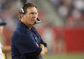FOXBORO, MA - AUGUST 20:  Head coach Bill Belichick of the New England Patriots looks on against the Cincinnati Bengals during their preseason game at Gillette Stadium on August 20, 2009 in Foxboro, Massachusetts.  (Photo by Jim Rogash/Getty Images)