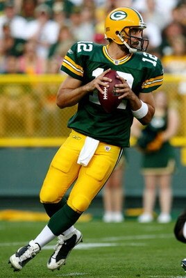 GREEN BAY, WI - AUGUST 15:  Quarterback Aaron Rodgers #12 of the Green Bay Packers looks to pass against the Cleveland Browns during the preseason game at Lambeau Field on August 15, 2009 in Green Bay, Wisconsin.  (Photo by Jonathan Daniel/Getty Images)