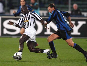 TURIN, ITALY - NOVEMBER 29:  Appiah of Juventus and C. Zanetti of Inter in action during the Italian Serie A 11th round match between Juventus and Inter at Delle Alpi Stadium on November 29, 203 in Turin, Italy.  (Photo by Getty Images) 