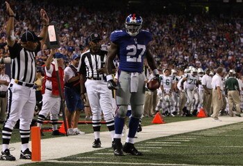 EAST RUTHERFORD, NJ - AUGUST 29:  Running back Brandon Jacobs #27 of the New York Giants celebrates after rushing for a touch down in the first quarter against the New York Jets during the preseason game at Giants Stadium on August 29, 2009 in East Ruther