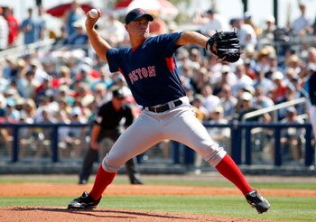 PORT CHARLOTTE, FL - FEBRUARY 27:  Pitcher Michael Bowden #64 of the Boston Red Sox pitches against the Tampa Bay Rays during a Grapefruit League Spring Training Game at Charlotte Sports Park on February 27, 2009 in Port Charlotte, Florida.  (Photo by J. 