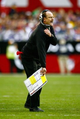GLENDALE, AZ - DECEMBER 14:  Head Coach Brad Childress of the Minnesota Vikings yells while on the playing field during their NFL game against the Arizona Cardinals at the University of Phoenix Stadium on December 14, 2008 in Glendale, Arizona. The Viking