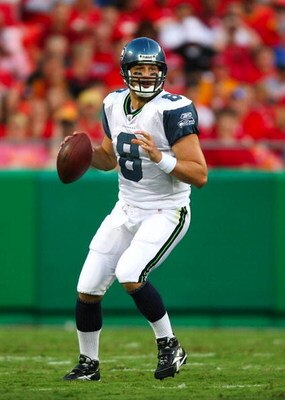 KANSAS CITY, MO - AUGUST 29: Quarterback Matt Hasselbeck #8 of the Seattle Seahawks looks to throw a pass against the Kansas City Chiefs during their preseason game at Arrowhead Stadium on August 29, 2009 in Kansas City, Missouri. (Photo by Dilip Vishwana