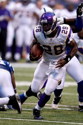 INDIANAPOLIS, IN - AUGUST 14: Running back Adrian Peterson #28 of the Minnesota Vikings runs with the football against the Indianapolis Colts at Lucas Oil Stadium on August 14, 2009 in Indianapolis, Indiana. (Photo by Scott Boehm/Getty Images)
