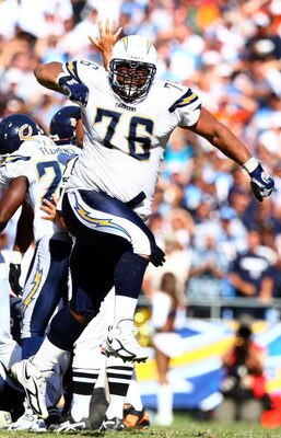 SAN DIEGO - SEPTEMBER 9:  Defensive Tackle Jamal Williams #76 of the San Diego Chargers celebrates the Chicago Bears' turnover on downs during the 4th quarter at Qualcomm Stadium September 9, 2007 in San Diego, California.  (Photo by Donald Miralle/Getty 