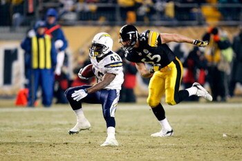 PITTSBURGH - JANUARY 11:  Darren Sproles #43 of the San Diego Chargers runs with the ball against Patrick Bailey #55 of the Pittsburgh Steelers during their AFC Divisional Playoff Game on January 11, 2009 at Heinz Field in Pittsburgh, Pennsylvania. Steele