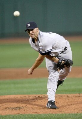 BOSTON - AUGUST 21:  Andy Pettitte #46  of the New York Yankees throws against the Boston Red Sox at Fenway Park on August 21, 2009 in Boston, Massachusetts. (Photo by Jim Rogash/Getty Images)