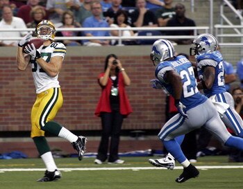 DETROIT , MI - SEPTEMBER 14:  Jordy Nelson #87 of the Green Bay Packers catches a touchdown pass in the second quarter against the Detroit Lions on September 14, 2008 at Ford Field in Detroit, Michigan.  (Photo by Domenic Centofanti/Getty Images)