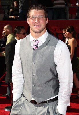 LOS ANGELES, CA - JULY 15:  Football player Tim Tebow arrives at the 2009 ESPY Awards held at Nokia Theatre LA Live on July 15, 2009 in Los Angeles, California. The 17th annual ESPYs will air on Sunday, July 19 at 9PM ET on ESPN.  (Photo by Jason Merritt/