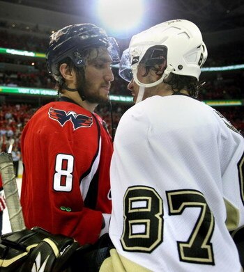 WASHINGTON - MAY 13: Alex Ovechkin #8 of the Washington Capitals and Sidney Crosby #87 of the Pittsburgh Penguins shake hands after Pittsburgh's 6-2 victory in Game Seven of the Eastern Conference Semifinal Round of the 2009 Stanley Cup Playoffs at Verizo