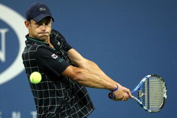 NEW YORK - AUGUST 31:   Andy Roddick returns a shot against  Bjorn Phau of Germany during day one of the 2009 U.S. Open at the USTA Billie Jean King National Tennis Center on August 31, 2009 in Flushing neighborhood of the Queens borough of New York City.