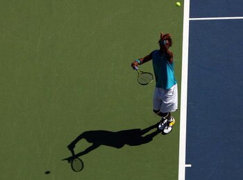 NEW YORK - SEPTEMBER 02:  Gael Monfils of France serves to Jeremy Chardy of France during day three of the 2009 U.S. Open at the USTA Billie Jean King National Tennis Center on September 2, 2009 in Flushing neighborhood of the Queens borough of New York C