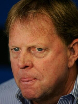 MILWAUKEE - JUNE 4: General Manager Jim Hendry of the Chicago Cubs talks with reporters before a game against the Milwaukee Brewers at Miller Park June 4, 2007 in Milwaukee, Wisconsin. (Photo by Jonathan Daniel/Getty Images)