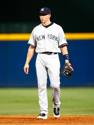 ATLANTA - JUNE 25: Cody Ransom #12 of the New York Yankees against the Atlanta Braves at Turner Field on June 25, 2009 in Atlanta, Georgia. (Photo by Kevin C. Cox/Getty Images)