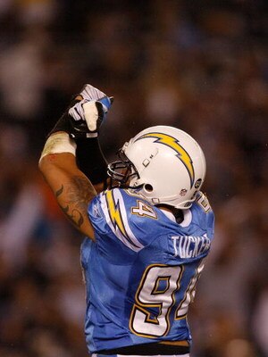SAN DIEGO - DECEMBER 04:  Linebacker Jyles Tucker #94 of the San Diego Chargers celebrates during their NFL Game against the Oakland Raiders on December 4, 2008 at Qualcomm Stadium in San Diego, California.  (Photo by Harry How/Getty Images)