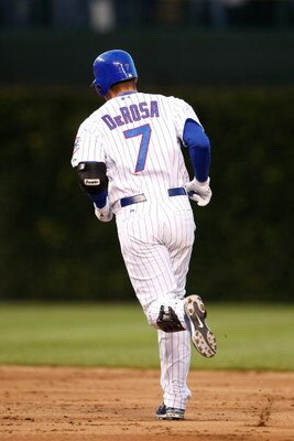 CHICAGO - OCTOBER 01:  Mark DeRosa #7 of the Chicago Cubs runs the bases on his 2-run home run in the bottom of the second inning against the Los Angeles Dodgers in Game One of the NLDS during the 2008 MLB Playoffs at Wrigley Field on October 1, 2008 in C