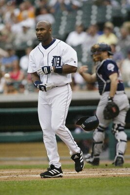 DETROIT - JULY 21:  Center fielder Wendell Magee #29 of the Detroit Tigers walks away from the plate after one of his three strike outs during the MLB game against the Minnesota Twins on July 21, 2002 at Comerica Park in Detroit, Michigan.  The Twins defe