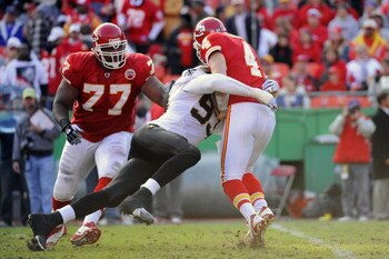 KANSAS CITY, MO - NOVEMBER 16:  Bobby McCray #93 of the New Orleans Saints sacks Tyler Thigpen #4 of the Kansas City Chiefs on November 16, 2008 at Arrowhead Stadium in Kansas City, Missouri.  The Saints defeated the Chiefs 30-20.  (Photo by G. Newman Low