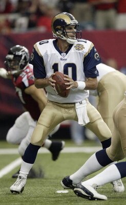 ATLANTA - SEPTEMBER 19:  Quaterback Marc Bulger #10 of the St. Louis Rams drops back to pass against the Atlanta Falcons during the game at the Georgia Dome on September 19, 2004 in Atlanta, Georgia. The Falcons defeated the Rams 34-17.  (Photo by Craig J