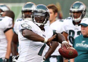 EAST RUTHERFORD, NJ - SEPTEMBER 3:  Quarterback Michael Vick #7 of the Philadelphia Eagles throws a pass during warm-up prior to the NFL preseason game against the New York Jets at Giants Stadium on September 3, 2009 in East Rutherford, New Jersey. (Photo