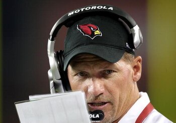 GLENDALE, AZ - AUGUST 22:  Head coach Ken Whisenhunt of the Arizona Cardinals walks the field during the preseason NFL game against the San Diego Chargers at the Universtity of Phoenix Stadium on August 22, 2009 in Glendale, Arizona. The Chargers defeated