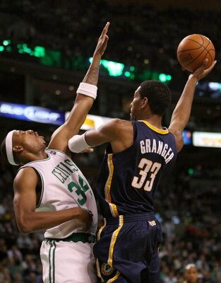 BOSTON - DECEMBER 03: Paul Pierce #34 of the Boston Celtics tries to block a pass by Danny Granger #33 of the Indiana Pacers on December 3, 2008 at TD Banknorth Garden in Boston, Massachusetts. The Celtics defeated the Pacers 114-96. NOTE TO USER: User ex