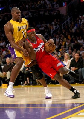 LOS ANGELES, CA - NOVEMBER 05:  Al Thornton #12 of the Los Angeles Clippers drives against Andrew Bynun #17 of the Los Angeles Lakers on November 5, 2008 at Staples Center in Los Angeles, California.  The Lakers won 106-88.  NOTE TO USER: User expressly a