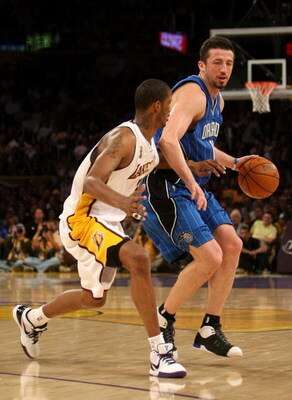 LOS ANGELES, CA - JUNE 07:  Hedo Turkoglu #15 of the Orlando Magic drives on Trevor Ariza #3 of the Los Angeles Lakers in Game Two of the 2009 NBA Finals at Staples Center on June 7, 2009 in Los Angeles, California. NOTE TO USER: User expressly acknowledg