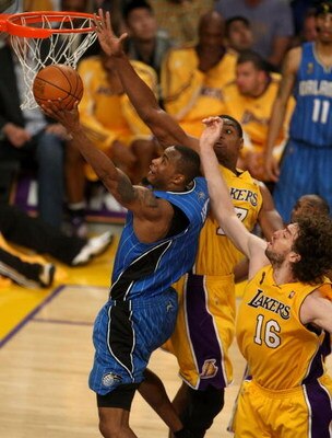 LOS ANGELES, CA - JUNE 04:  Rashard Lewis #9 of the Orlando Magic goes up for a shot against Andrew Bynum #17 and Pau Gasol #16 of the Los Angeles Lakers in the second half of Game One of the 2009 NBA Finals at Staples Center on June 4, 2009 in Los Angele