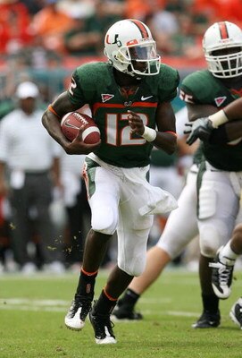 MIAMI - OCTOBER 25:  Quarterback Jacory Harris #12 of the Miami Hurricanes looks for room to run while taking on the Wake Forest Demon Decons at Dolphin Stadium on October 25, 2008 in Miami, Florida. Miami defeated Wake Forest 16-10.  (Photo by Doug Benc/